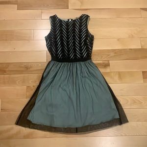 Light blue or teal and black dress
